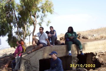 On the Northern border, which used to be in Syria prior to 1957. Lynn, Evon, Stacey, Alyssa, and Ilana listen to Paul's personal stories from the frontlines