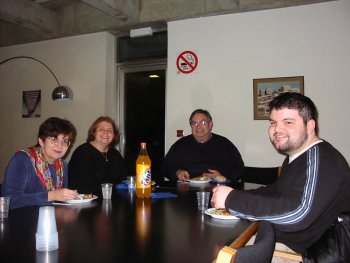 Devorah Avery sits with her brother and parents at a student dinner with Dr Lisa Grant